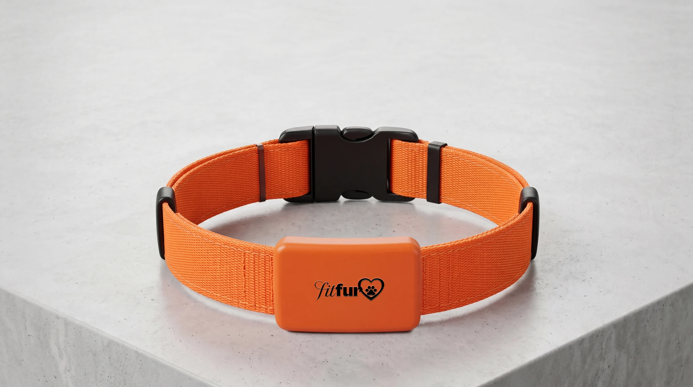 Orange FitFur smart collar with its tracking module